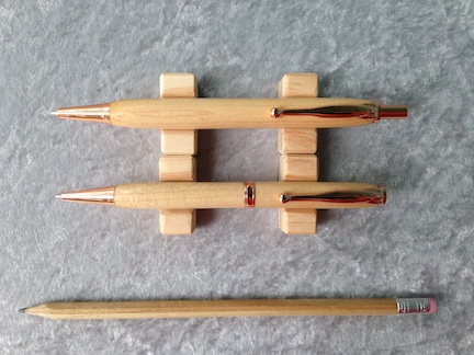 Comfort grip pen and pencil set in maple and rose gold.